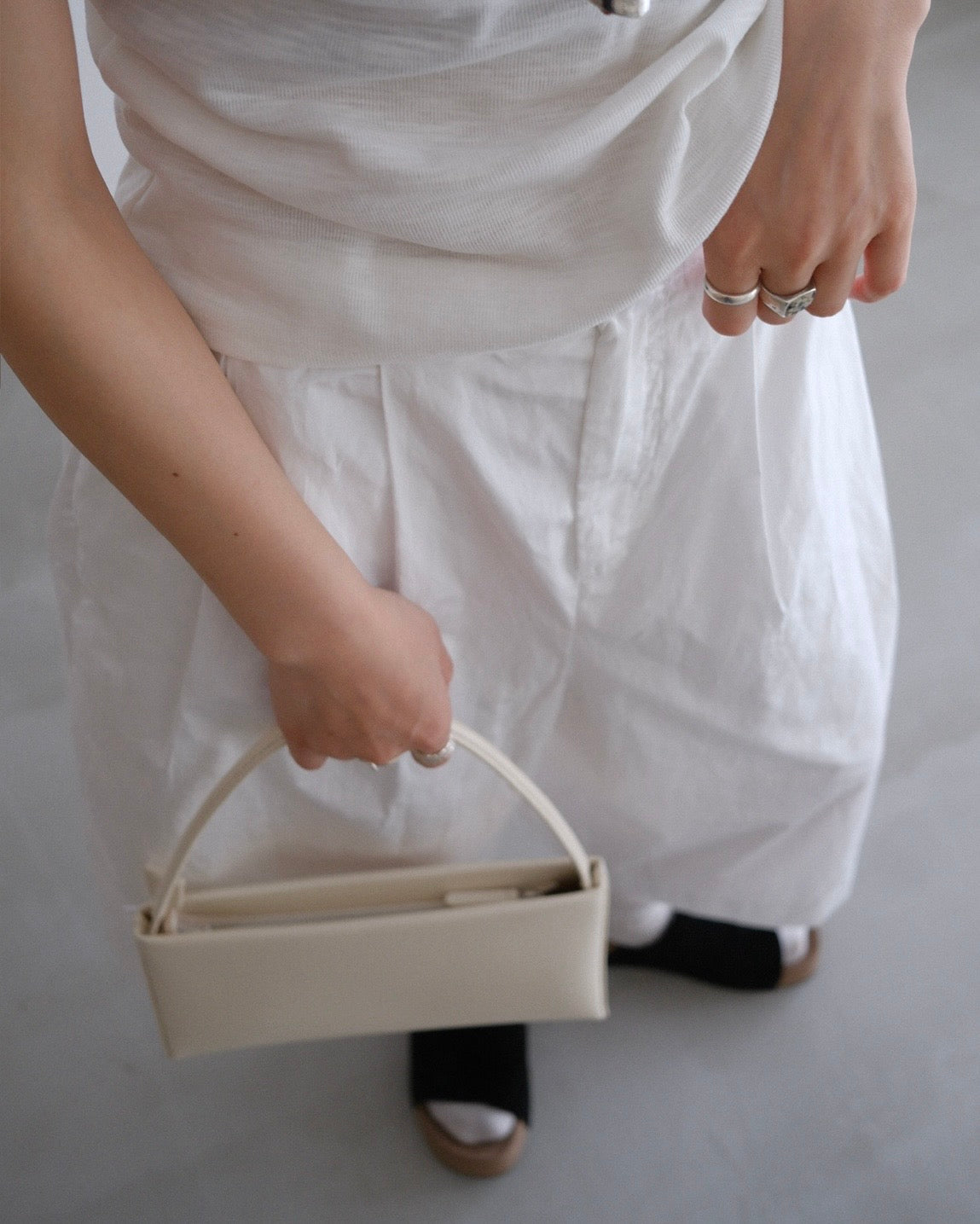 slim leather handle bag white